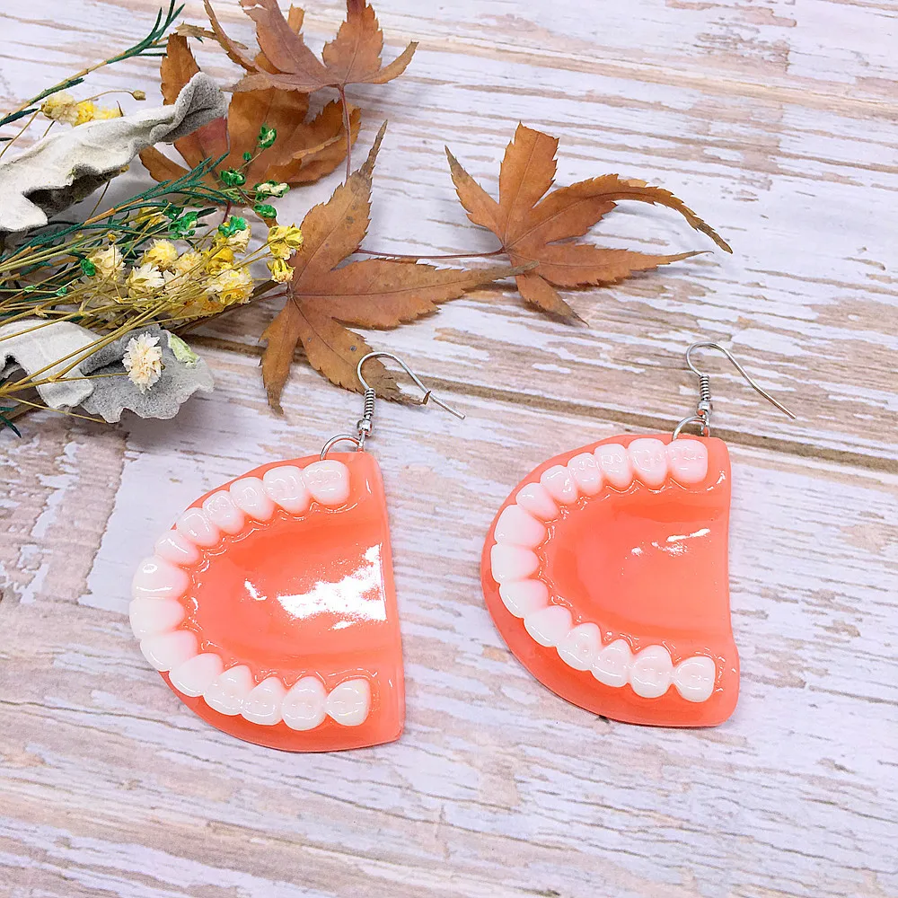 Resin Horror 3D Creative Personality Tooth Earrings Exaggerated Spoof Denture Earrings
Resin Horror 3D Creative Personality Tooth Earrings Exaggerated Spoof Denture Earrings