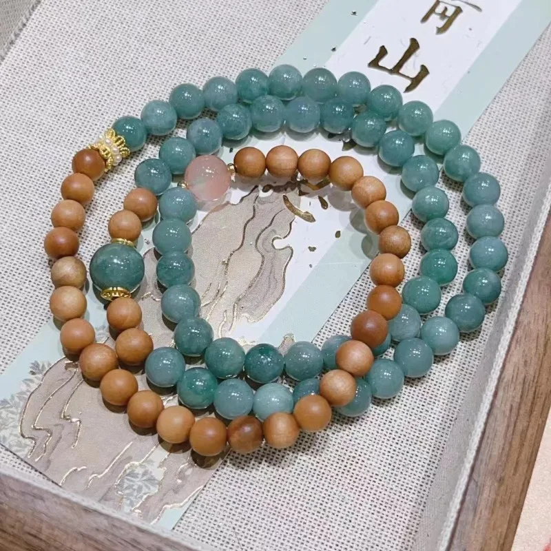 New Natural Jadeite Multi-circle Beads with Laoshan Sandalwood Beads Bracelet Exquisite Women's Models
New Natural Jadeite Multi-circle Beads with Laoshan Sandalwood Beads Bracelet Exquisite Women's Models