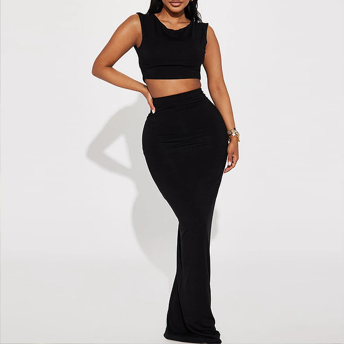 Women's short exposed navel sleeveless T-shirt with high waist and buttocks wrapped skirt casual set
Women's short exposed navel sleeveless T-shirt with high waist and buttocks wrapped skirt casual set