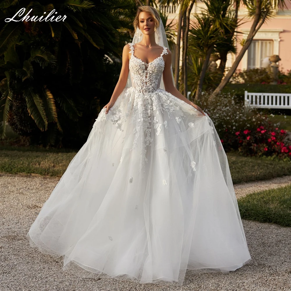 Lhuilier Customized Sexy A Line V Neck Tulle Wedding Dresses See Through Beaded Lace Bridal Gowns with Court Train
Lhuilier Customized Sexy A Line V Neck Tulle Wedding Dresses See Through Beaded Lace Bridal Gowns with Court Train