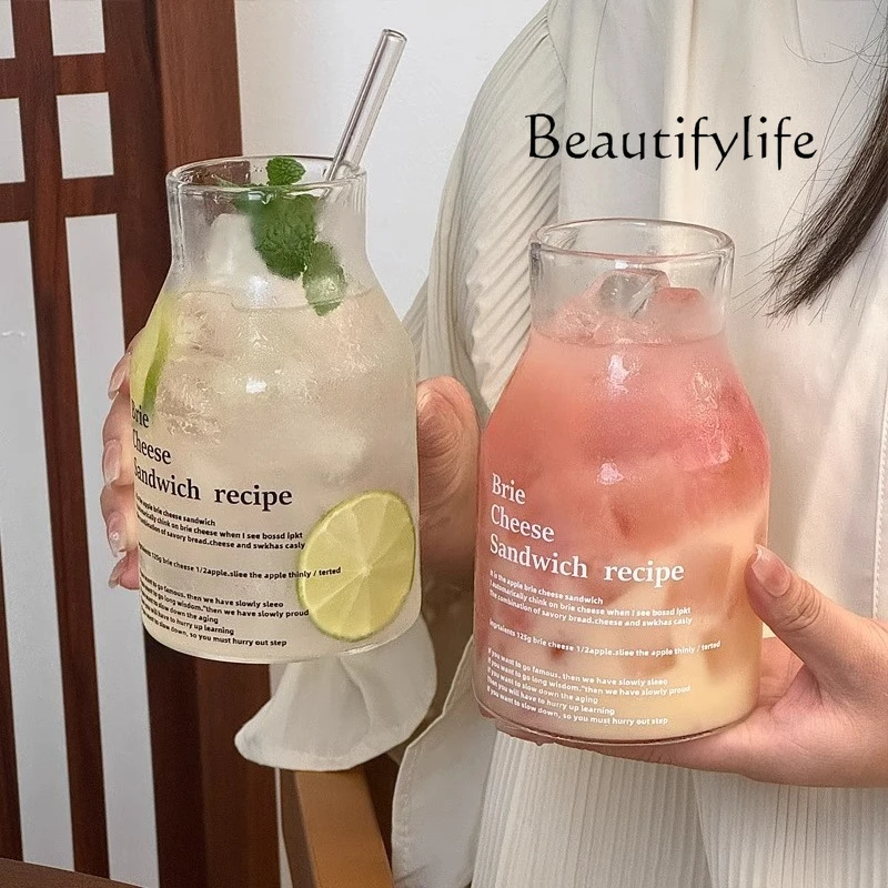 Simple and high-value letter bubble tea cup Large capacity heat-resistant glass milk latte coffee cup
Simple and high-value letter bubble tea cup Large capacity heat-resistant glass milk latte coffee cup