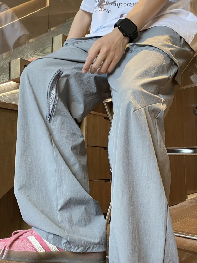 Американские летние тонкие прямые брюки в стиле рабочей одежды, свободного кроя, молодежные, в стиле парашютиста, модные повседневные брюки
Американские летние тонкие прямые брюки в стиле рабочей одежды, свободного кроя, молодежные, в стиле парашютиста, модные повседневные брюки