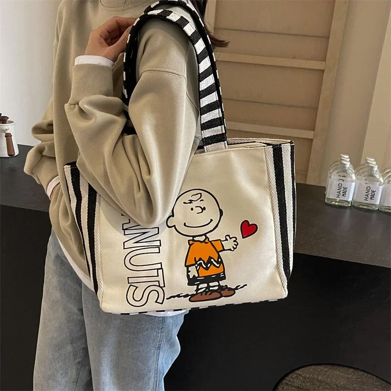 Snoopy's New girl Canvas Shoulder Bag Cartoon Cute Handbag Color-Block Striped Letter storage Tote Bag
Snoopy's New girl Canvas Shoulder Bag Cartoon Cute Handbag Color-Block Striped Letter storage Tote Bag