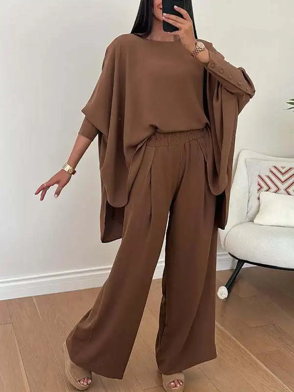 2024 new autumn and winter women's solid color suit round neck bat sleeve design loose casual long-sleeved trousers suit
2024 new autumn and winter women's solid color suit round neck bat sleeve design loose casual long-sleeved trousers suit