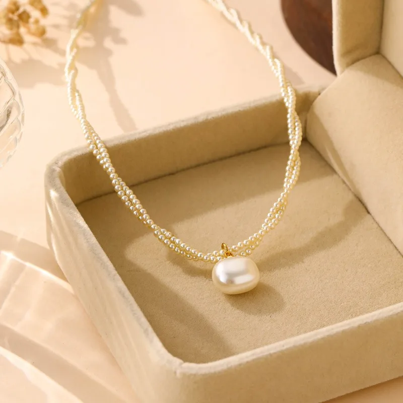 French Double-layer Pearl Steamed Bread Beads Pendant Necklace High-end Fashion Light Luxury Exquisite Collarbone Chain Versatil
French Double-layer Pearl Steamed Bread Beads Pendant Necklace High-end Fashion Light Luxury Exquisite Collarbone Chain Versatil