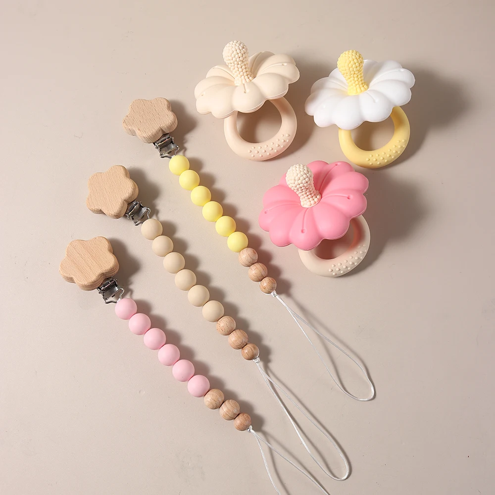 New arrive baby teether set Baby flower shape Teether silicone pacifier teether large size baby BPA free big teether toy
New arrive baby teether set Baby flower shape Teether silicone pacifier teether large size baby BPA free big teether toy