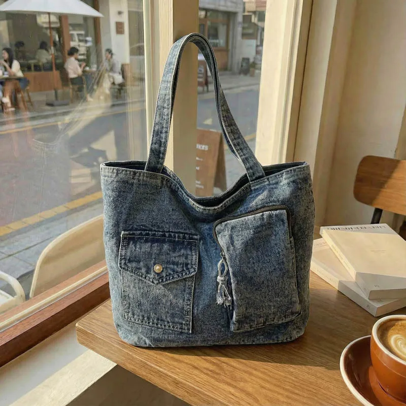 Стильная джинсовая удобная и универсальная большая сумка для женщин, большая вместительная сумка на плечо, модная корейская простая сумка для хранения
Стильная джинсовая удобная и универсальная большая сумка для женщин, большая вместительная сумка на плечо, модная корейская простая сумка для хранения