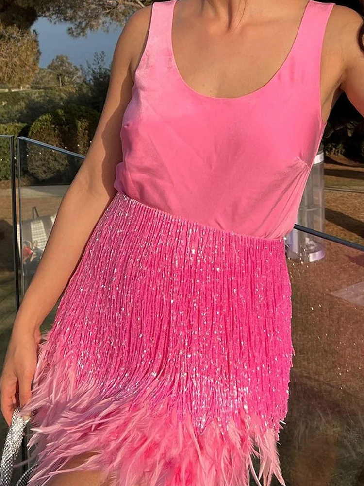 Сексуальные вечерние юбки без рукавов, элегантный пуловер с круглым вырезом и мини-юбки, женские модные однотонные костюмы из 2 предметов с бахромой
Сексуальные вечерние юбки без рукавов, элегантный пуловер с круглым вырезом и мини-юбки, женские модные однотонные костюмы из 2 предметов с бахромой