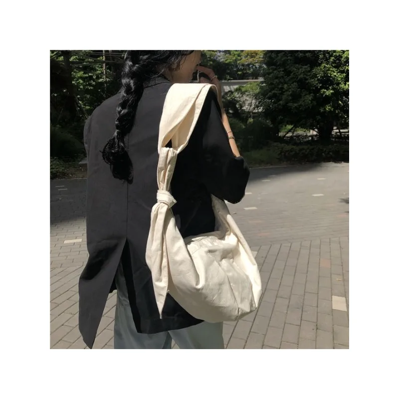 2024 Spring and Summer Lazy Wind Canvas Personalized Simple Literary Knotted Dumpling Single Shoulder Crossbody for Women
2024 Spring and Summer Lazy Wind Canvas Personalized Simple Literary Knotted Dumpling Single Shoulder Crossbody for Women