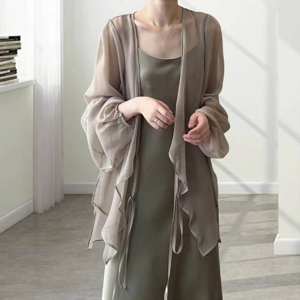 See-through Lace-Up Chiffon Sun Protection Cardigan V-neck Lantern Long Sleeve Chiffon Top Women Summer Irregular Hem Shawl Coat
See-through Lace-Up Chiffon Sun Protection Cardigan V-neck Lantern Long Sleeve Chiffon Top Women Summer Irregular Hem Shawl Coat
