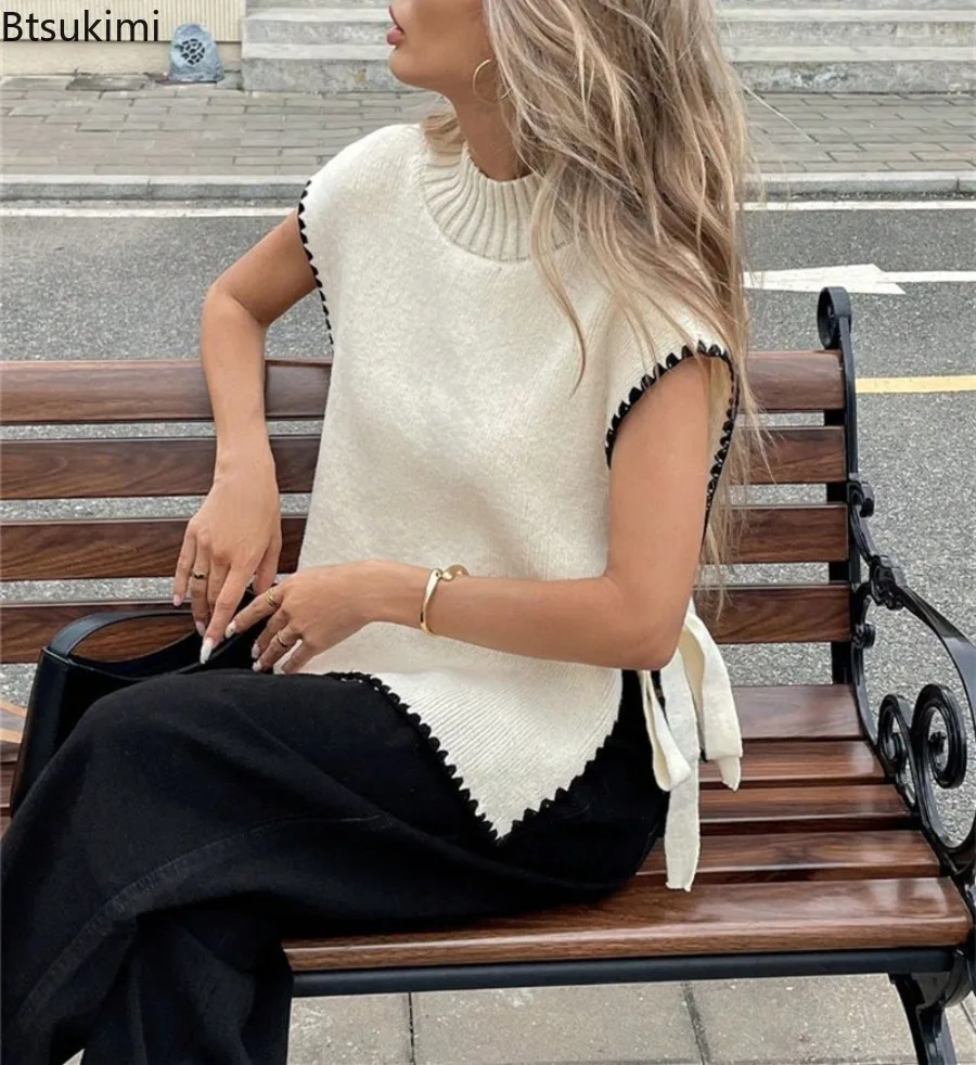 2026 Fashion Sweater Spring New Women's Mock Neck Sleeveless Sweater Vest with Simple Design Contrasting Colors Bow Tie Tie Top
2026 Fashion Sweater Spring New Women's Mock Neck Sleeveless Sweater Vest with Simple Design Contrasting Colors Bow Tie Tie Top