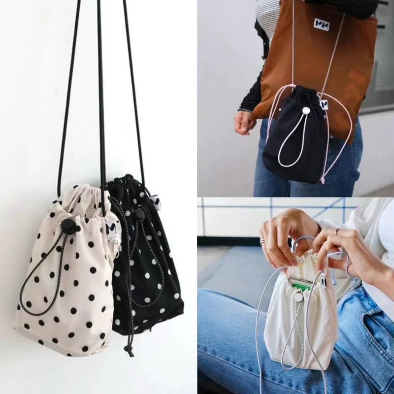 Stylish Polka Dot Drawstring Crossbody Bag Fashion New Korean Mobile Phone Bag Lightweight And Portable Outdoor Storage Bag
Stylish Polka Dot Drawstring Crossbody Bag Fashion New Korean Mobile Phone Bag Lightweight And Portable Outdoor Storage Bag