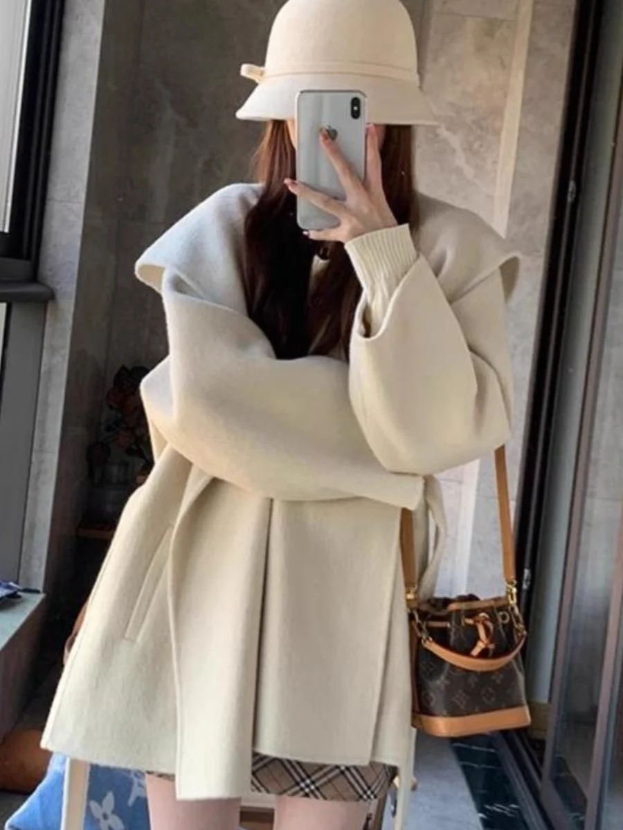 Double-Sided Camere ort Coat Korean Sle Women's Winter New Arrival Woolen Coat with Hood Long Sve Regular Fit
Double-Sided Camere ort Coat Korean Sle Women's Winter New Arrival Woolen Coat with Hood Long Sve Regular Fit