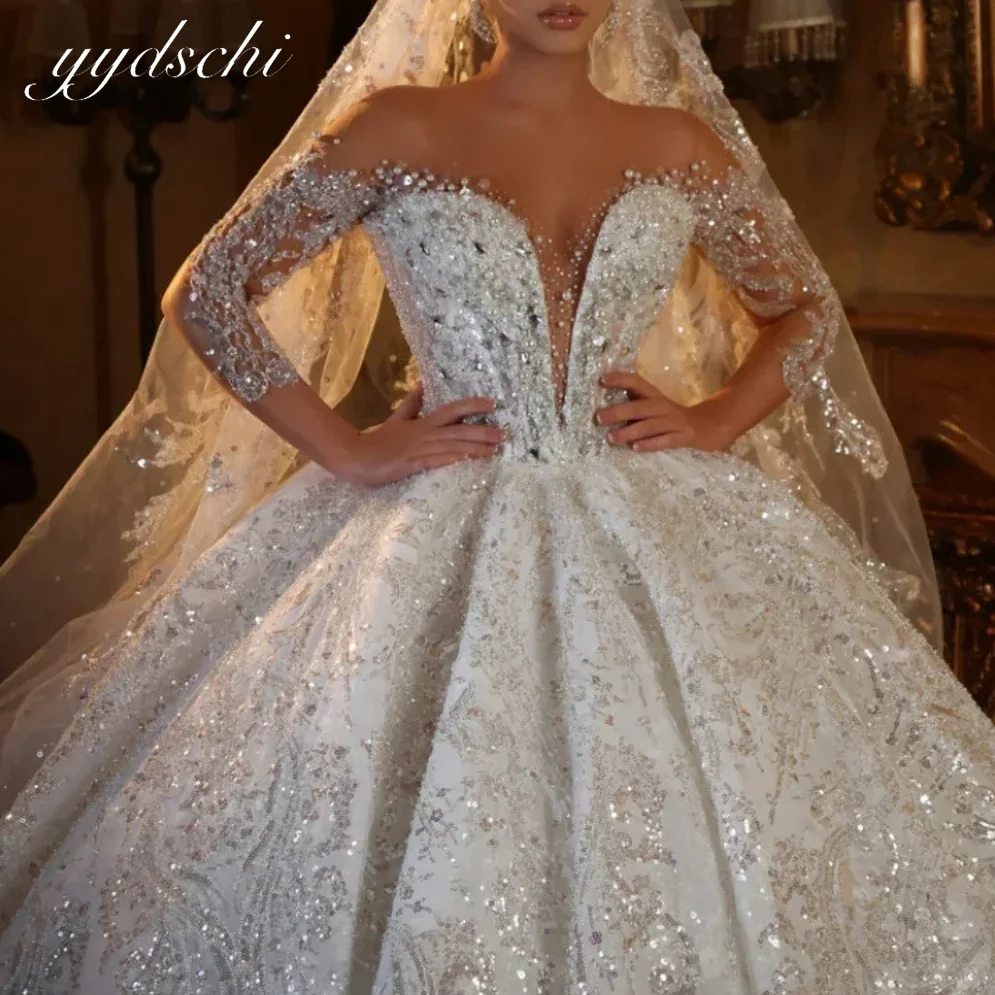 Customized Dubai Luxury Deep V Wedding Dresses Shiny Crystal Beaded 2025 New Court Train Bridal Gowns Tulle Vestidos De Novia
Customized Dubai Luxury Deep V Wedding Dresses Shiny Crystal Beaded 2025 New Court Train Bridal Gowns Tulle Vestidos De Novia