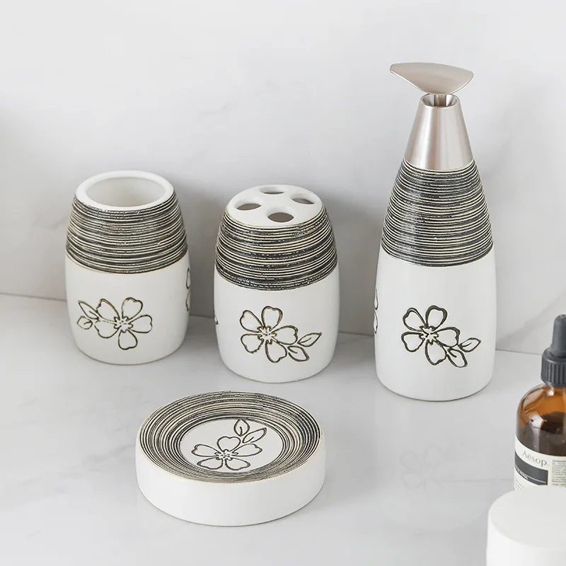 Light luxury high-end washing kit sub-bottle flower white body bathroom lotion bottle soap dish ceramic bathroom four-piece set
Light luxury high-end washing kit sub-bottle flower white body bathroom lotion bottle soap dish ceramic bathroom four-piece set