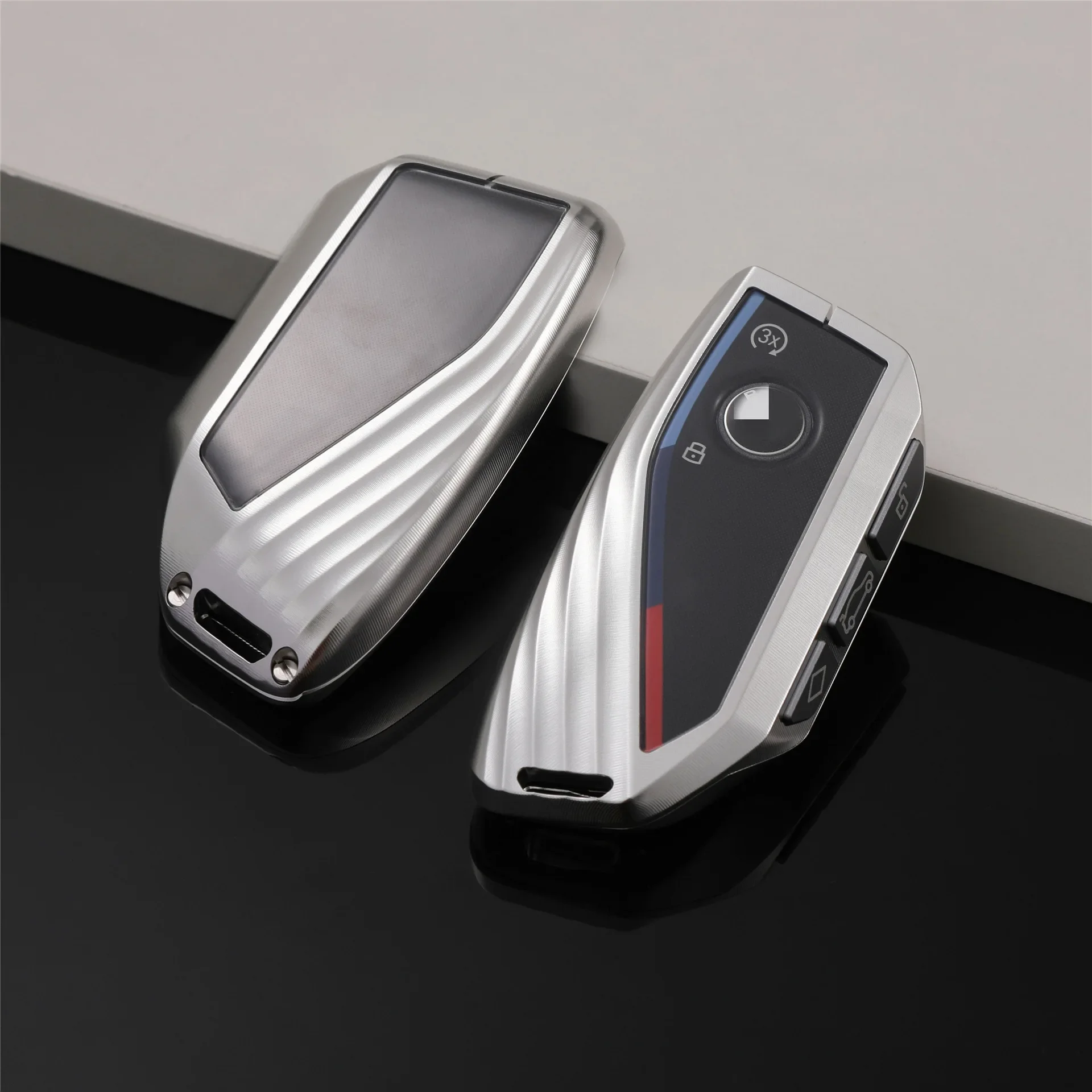 Suitable for BMW key cover new 5 series 7 series 3 X LCD key cover metal aluminum alloy popular
Suitable for BMW key cover new 5 series 7 series 3 X LCD key cover metal aluminum alloy popular
