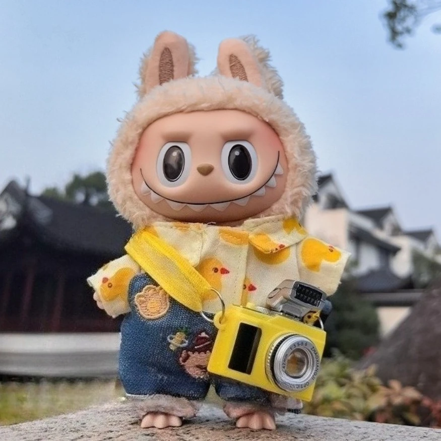 Labubu Clothes for 15/17cm Doll Straps Pants Skirts Cute T-shirts Travel Set Flash Camera Accessories
Labubu Clothes for 15/17cm Doll Straps Pants Skirts Cute T-shirts Travel Set Flash Camera Accessories