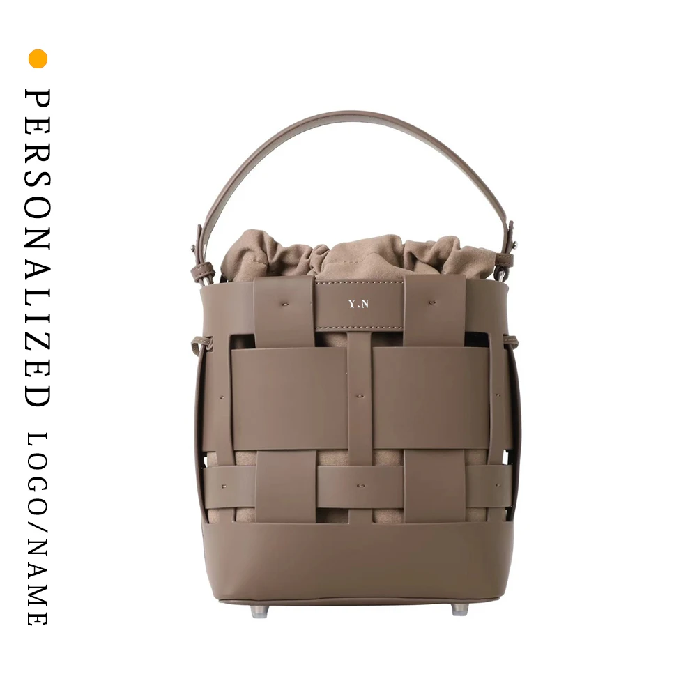 Custom First Letter Free Gold Stamping Hand Braided Cowhide Tote Bag Fashionable Hollow Handbag Large Capacity Shoulder Bag 
Custom First Letter Free Gold Stamping Hand Braided Cowhide Tote Bag Fashionable Hollow Handbag Large Capacity Shoulder Bag