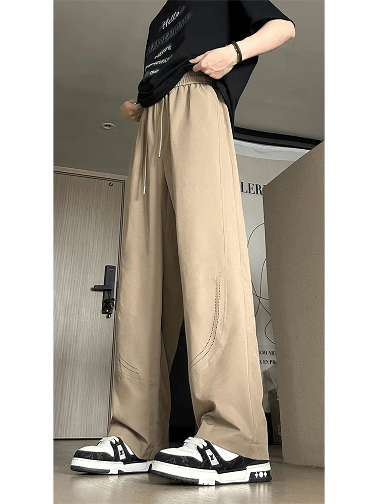 Дышащие тонкие повседневные брюки из ледяного шелка для мужчин, летние свободные прямые брюки с широкими штанинами, комфортные легкие брюки
Дышащие тонкие повседневные брюки из ледяного шелка для мужчин, летние свободные прямые брюки с широкими штанинами, комфортные легкие брюки