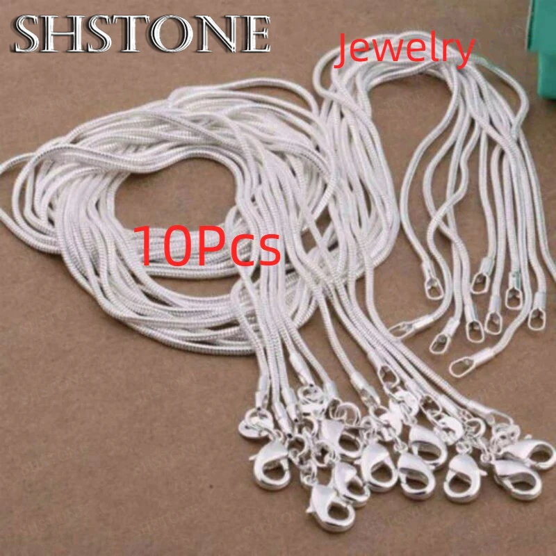 SHSTONE 10pcs Lot 40-75cm 925 Sterling Silver 1MM Snake Chain Necklace for Women Men Fashion Party Wedding Jewelry Gifts
SHSTONE 10pcs Lot 40-75cm 925 Sterling Silver 1MM Snake Chain Necklace for Women Men Fashion Party Wedding Jewelry Gifts