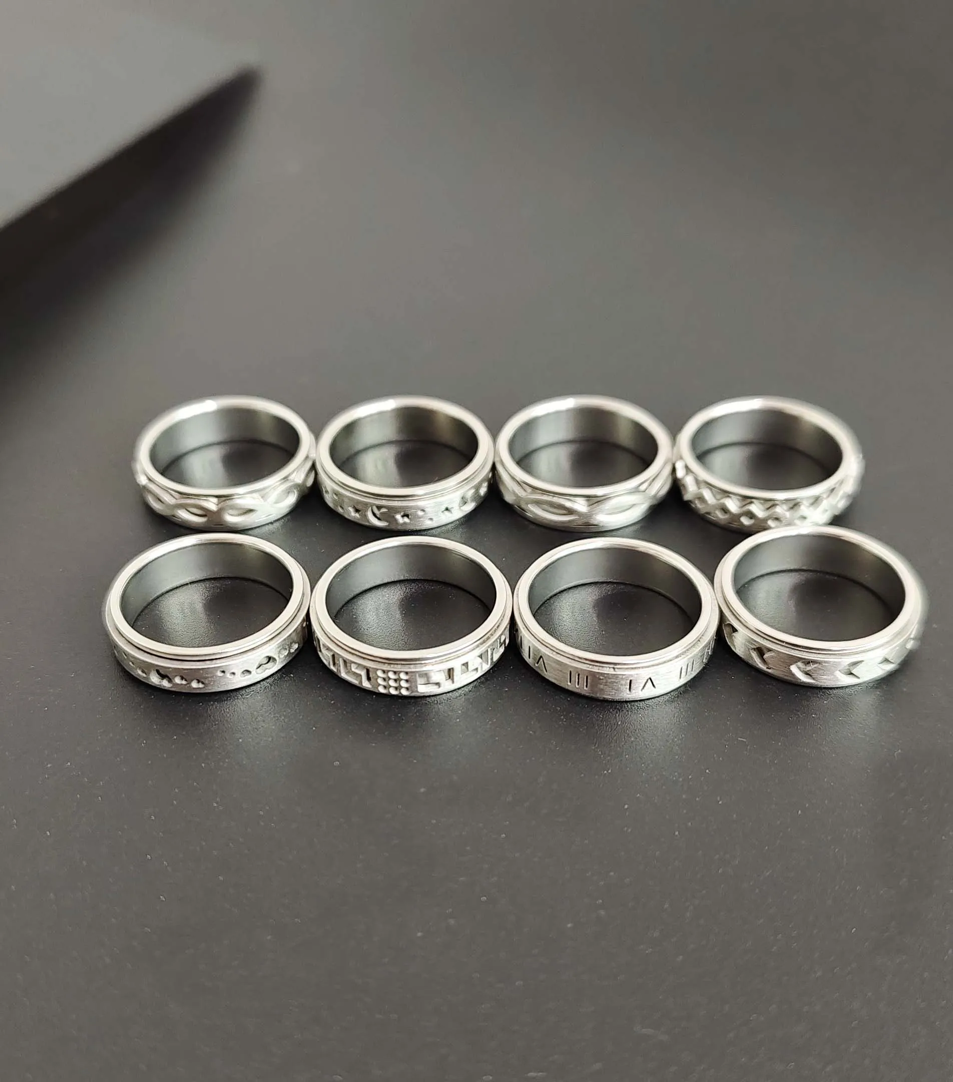 8-piece fashionable design stainless steel rotating men's decompression and anti anxiety ring set.
8-piece fashionable design stainless steel rotating men's decompression and anti anxiety ring set.