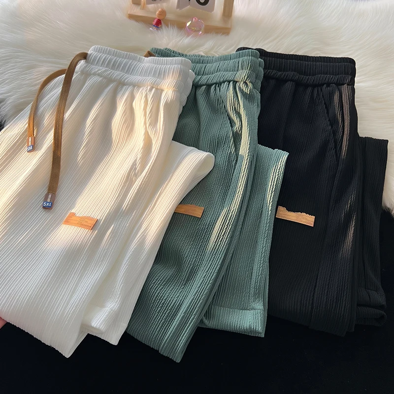 Складные летние тонкие повседневные брюки из ледяного шелка для мужчин, свободные прямые брюки, быстросохнущие спортивные брюки, молодежные модные прямые брюки...
Складные летние тонкие повседневные брюки из ледяного шелка для мужчин, свободные прямые брюки, быстросохнущие спортивные брюки, молодежные модные прямые брюки...