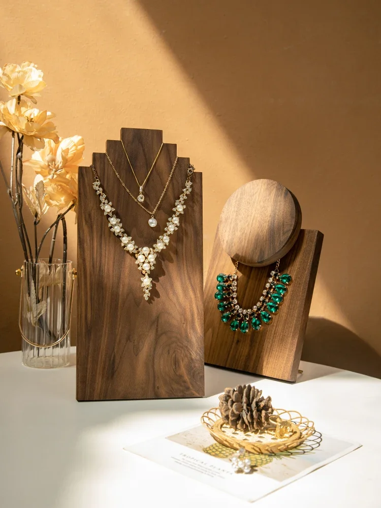 Walnut Standing High-end Necklace Stand Artistic Sense Heavy Industry Necklace Display Props
Walnut Standing High-end Necklace Stand Artistic Sense Heavy Industry Necklace Display Props