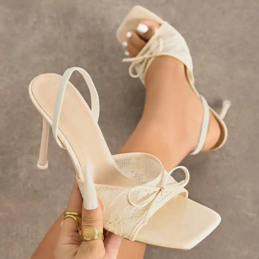 Womens Ivory Lace Peep Toe Square Heel Sandals With Bow Detail
Womens Ivory Lace Peep Toe Square Heel Sandals With Bow Detail