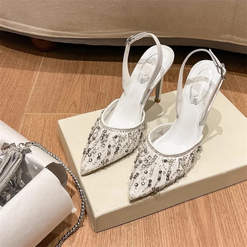 Spring and summer new pointed shallow rhinestone beaded mesh wedding shoes thin high-heeled banquet small size women's sandals
Spring and summer new pointed shallow rhinestone beaded mesh wedding shoes thin high-heeled banquet small size women's sandals