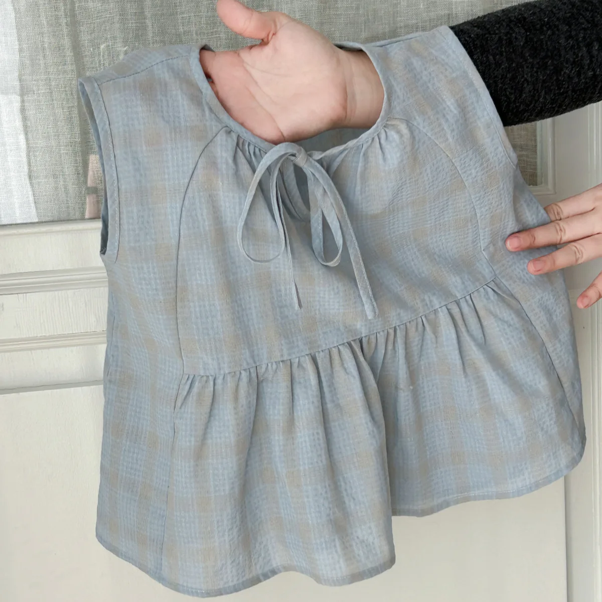 Girls Top Cool 2025 Summer Girls' New Checkered Sleeveless Sweet and Cute Lotus Leaf Pendant Top
Girls Top Cool 2025 Summer Girls' New Checkered Sleeveless Sweet and Cute Lotus Leaf Pendant Top