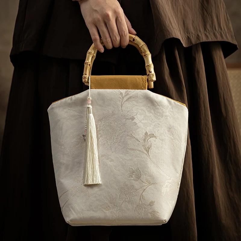 Винтажная литературная сумка с кисточками в новом китайском стиле, сумка-ханьфу, женская сумка, сумка в стиле бамбукового шва, сумка для чонсама
Винтажная литературная сумка с кисточками в новом китайском стиле, сумка-ханьфу, женская сумка, сумка в стиле бамбукового шва, сумка для чонсама
