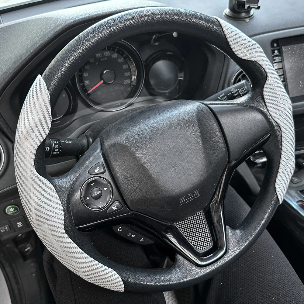 Glossy Carbon Fiber Steering Wheel Cover, 2-Piece Set with Realistic Carbon Texture, Anti-Slip Breathable Driving Grip Accessory
Glossy Carbon Fiber Steering Wheel Cover, 2-Piece Set with Realistic Carbon Texture, Anti-Slip Breathable Driving Grip Accessory