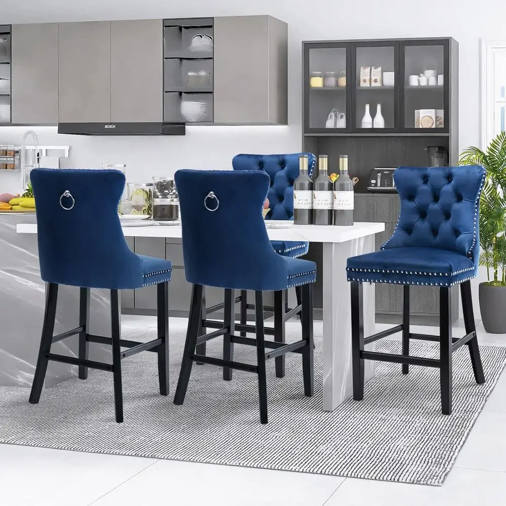 Blue Velvet Button-Tufted Bar Stools Set of 4 with Wooden Legs and Chrome Nail Accents
Blue Velvet Button-Tufted Bar Stools Set of 4 with Wooden Legs and Chrome Nail Accents