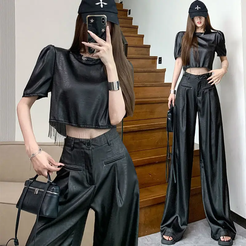 New Summer High-end Advanced Temperature Fashionable Tassel Jacquard Short-sleeved Top + Wide-leg Floor Trousers for Women
New Summer High-end Advanced Temperature Fashionable Tassel Jacquard Short-sleeved Top + Wide-leg Floor Trousers for Women