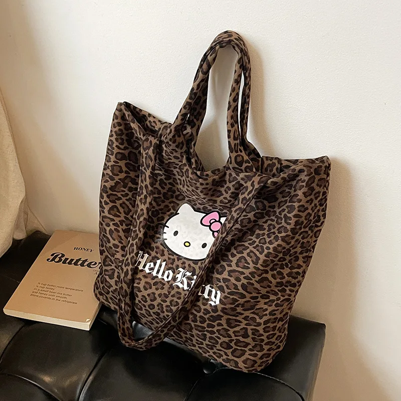 Hello Kitty Leopard Print Large Capacity Tote Bag Canvas Crossbody Shoulder Bag with Kitty Logo for Daily Use Shopping bag
Hello Kitty Leopard Print Large Capacity Tote Bag Canvas Crossbody Shoulder Bag with Kitty Logo for Daily Use Shopping bag