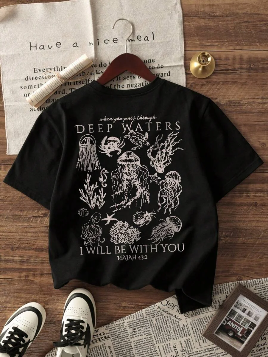 Plus - Size Religious Ocean Graphic Tee, Black Short - Sleeve with “DEEP WATERS” Print
Plus - Size Religious Ocean Graphic Tee, Black Short - Sleeve with “DEEP WATERS” Print