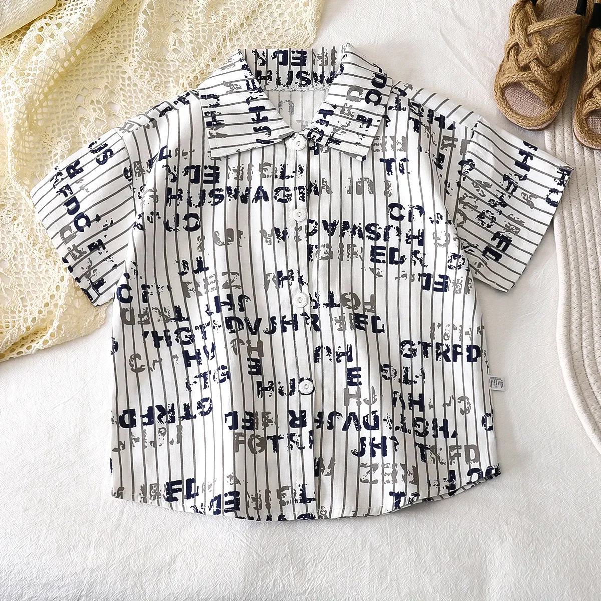 New 2025 Boys Summer Thin Beach Shirts Children's Cartoon Striped Letter Print Short Sleeve Lapel Shirt Top Kids Casual Clothing
New 2025 Boys Summer Thin Beach Shirts Children's Cartoon Striped Letter Print Short Sleeve Lapel Shirt Top Kids Casual Clothing