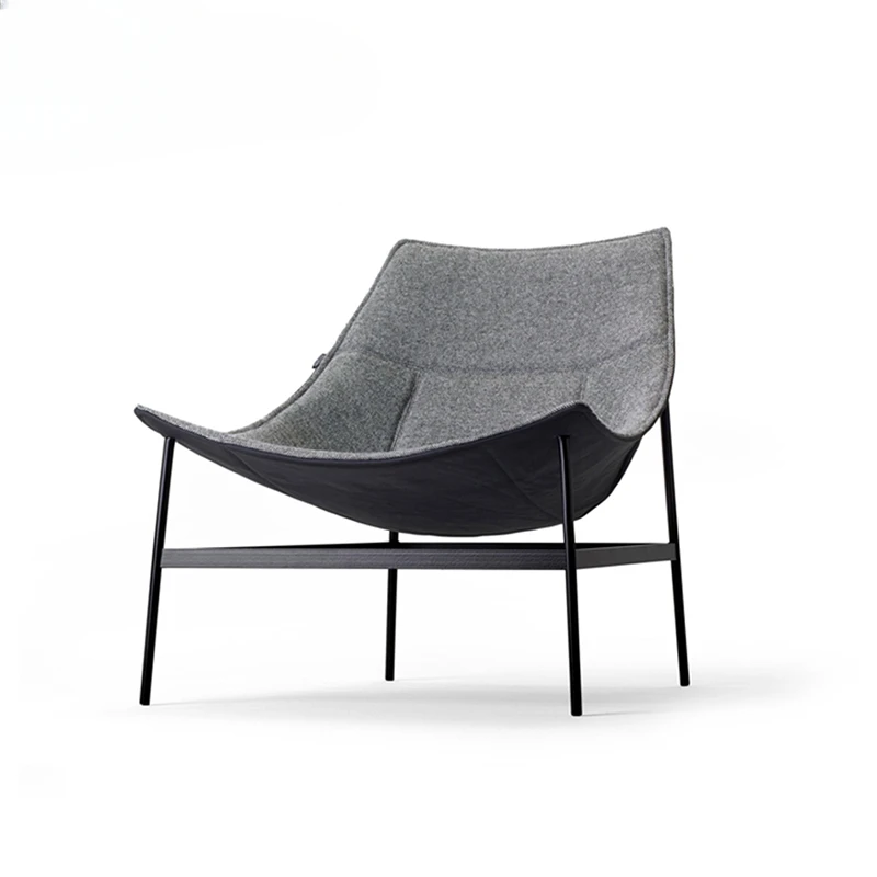 Simple modern designer model room leisure chair lazy recliner office lunch break back chair
Simple modern designer model room leisure chair lazy recliner office lunch break back chair