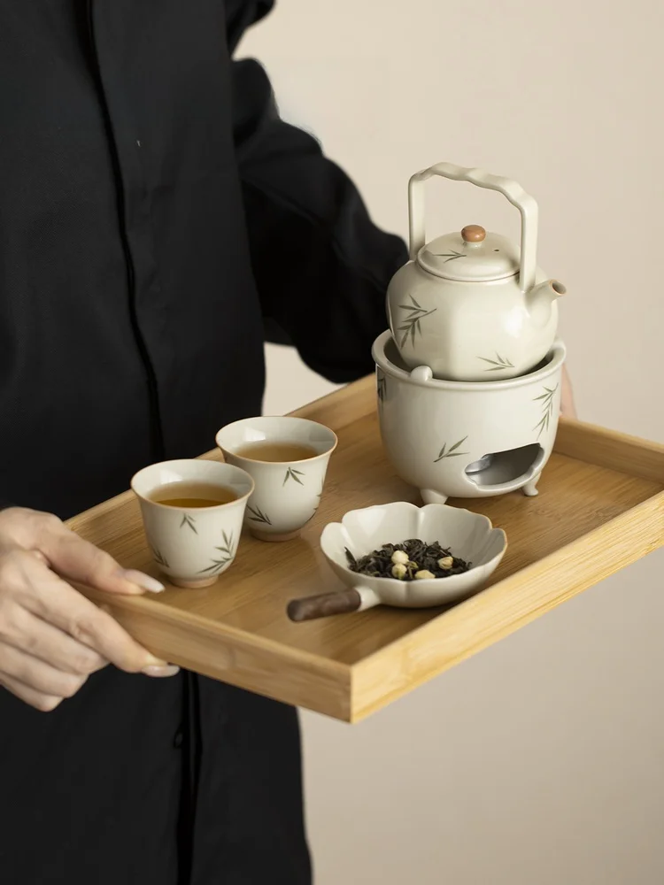 Wu Xin Micro Cooking Tea Pot Tea Cup Set for Home Use Kung Fu Tea Brewing Bamboo Tray Ceramic Tea Set for Two People
Wu Xin Micro Cooking Tea Pot Tea Cup Set for Home Use Kung Fu Tea Brewing Bamboo Tray Ceramic Tea Set for Two People
