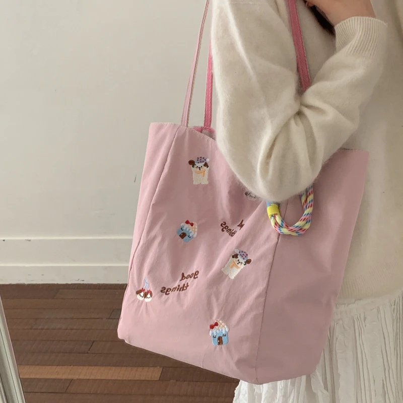 New Cartoon Embroidery Tote Bag Women's Korean Style Ins Trendy Large Capacity Shoulder Bag Commuting Versatile Canvas Bag
New Cartoon Embroidery Tote Bag Women's Korean Style Ins Trendy Large Capacity Shoulder Bag Commuting Versatile Canvas Bag