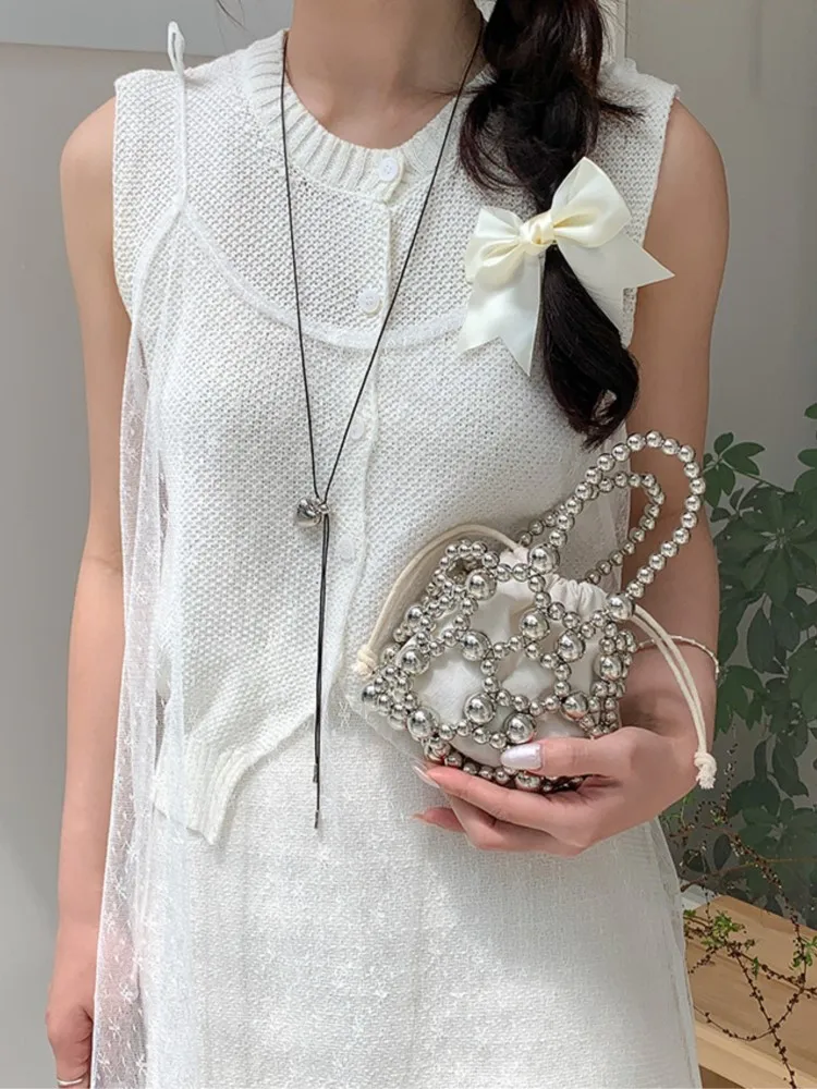 Mini Pearl Bag Women Hollowed Out Korean Version Chain Crossbody Bags 2025 New Summer Fashion Simple Hand Woven Shoulder Bags
Mini Pearl Bag Women Hollowed Out Korean Version Chain Crossbody Bags 2025 New Summer Fashion Simple Hand Woven Shoulder Bags