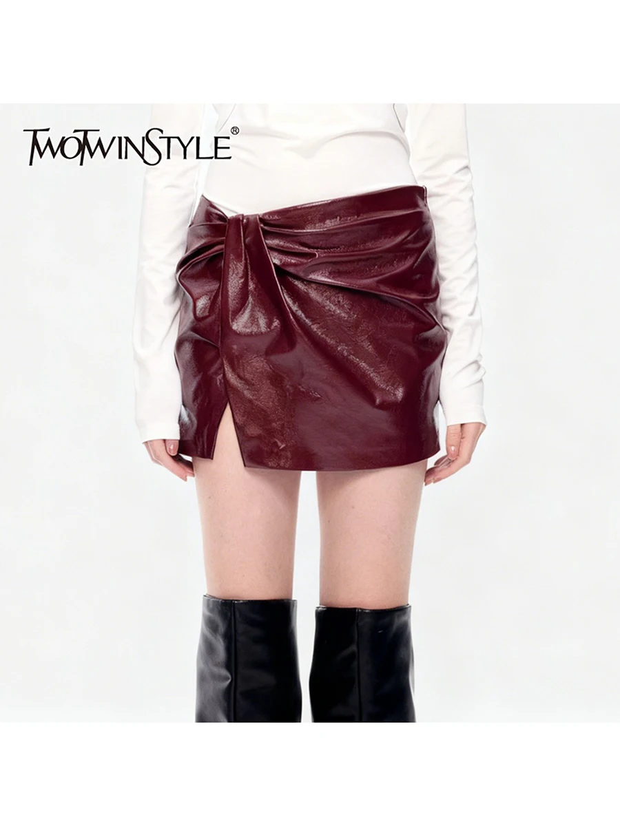 TWOTWINSTYLE Solid Slimming Spliced Shirring Fashion Mini Skirts for Women High Waist Split Irregular Leather Skirt Female New
TWOTWINSTYLE Solid Slimming Spliced Shirring Fashion Mini Skirts for Women High Waist Split Irregular Leather Skirt Female New