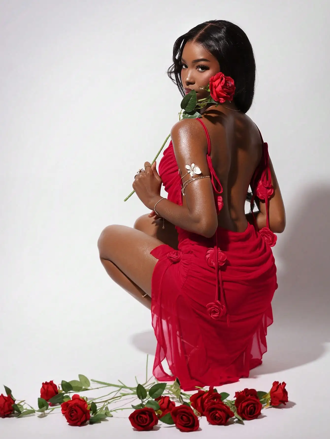 Red Backless Mini Dress with Ruched Detail, Spaghetti Straps, Floral Appliqués
Red Backless Mini Dress with Ruched Detail, Spaghetti Straps, Floral Appliqués