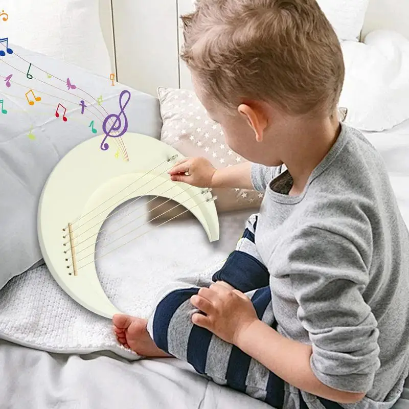 String Lyre Harp Wooden Lyre Harp 7 Strings Moon Lyre Piano Crescent Musical Instrument Portable Harp Instrument with Tuning
String Lyre Harp Wooden Lyre Harp 7 Strings Moon Lyre Piano Crescent Musical Instrument Portable Harp Instrument with Tuning