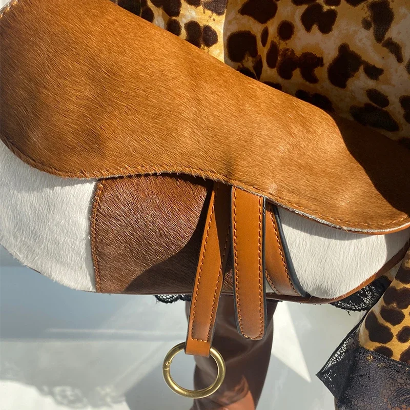 True Horse Hair Saddle Bag 2024 New Women's Bag Single Shoulder Diagonal Straddle Horse Leather Gun Bag Riveted Wide Shoulder St
True Horse Hair Saddle Bag 2024 New Women's Bag Single Shoulder Diagonal Straddle Horse Leather Gun Bag Riveted Wide Shoulder St
