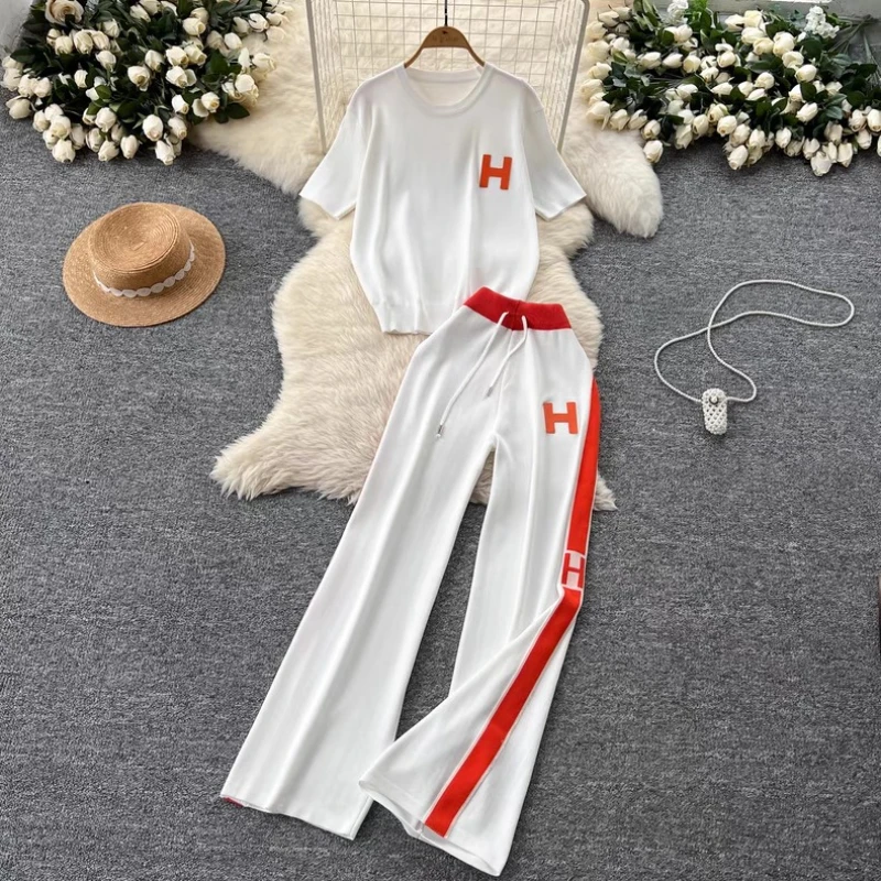 Women's new Korean version loose letter embroidered knitted T-shirt top+high waist slimming wide leg pants two-piece set
Women's new Korean version loose letter embroidered knitted T-shirt top+high waist slimming wide leg pants two-piece set