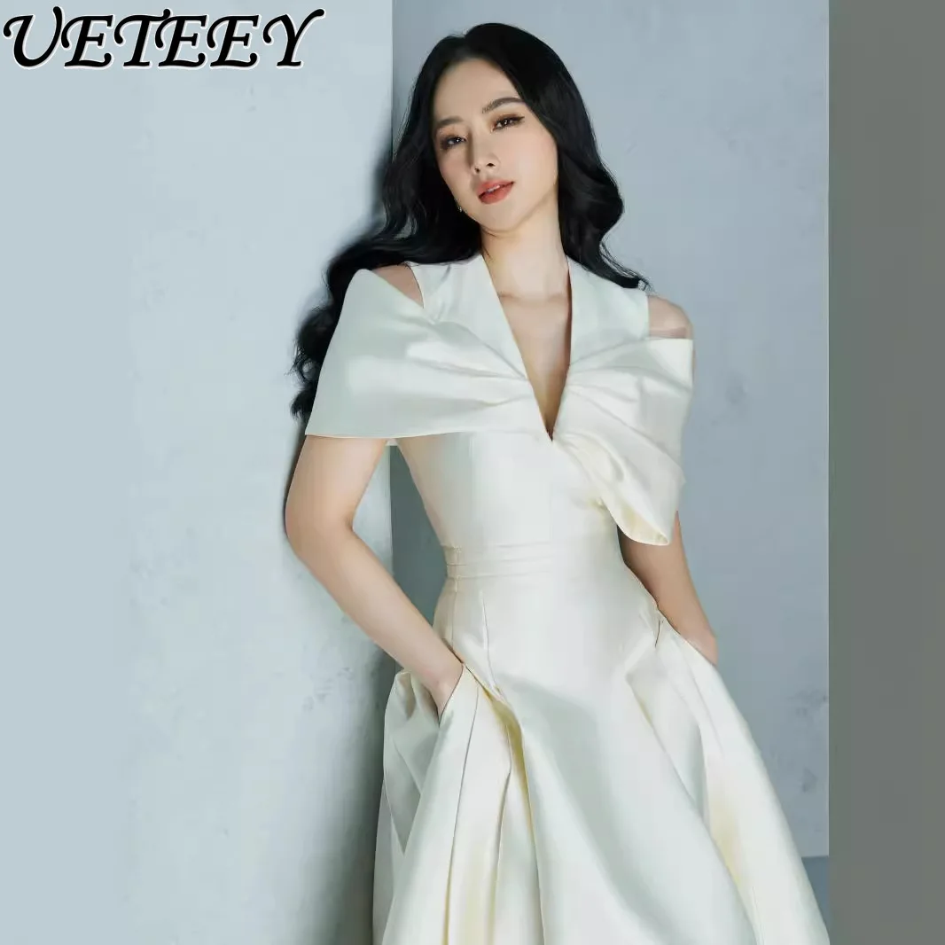 2025 Autumn Summer Niche Design V-neck Bow High-waisted Maxi Dress Big Pendulum Solid Color Birthday Party Long Dresses
2025 Autumn Summer Niche Design V-neck Bow High-waisted Maxi Dress Big Pendulum Solid Color Birthday Party Long Dresses