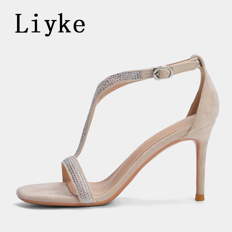 Летние дизайнерские босоножки Liyke с открытым носком, стразами и Т-образным ремешком, на шпильке, сексуальные женские туфли для вечеринок, абрикосовые
Летние дизайнерские босоножки Liyke с открытым носком, стразами и Т-образным ремешком, на шпильке, сексуальные женские туфли для вечеринок, абрикосовые