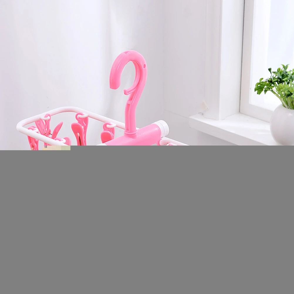 12 Clips Foldable Rust Resistant Clothes Hanging Rack Drying Hanger Laundry Pegs Hooks Storage Solution
12 Clips Foldable Rust Resistant Clothes Hanging Rack Drying Hanger Laundry Pegs Hooks Storage Solution