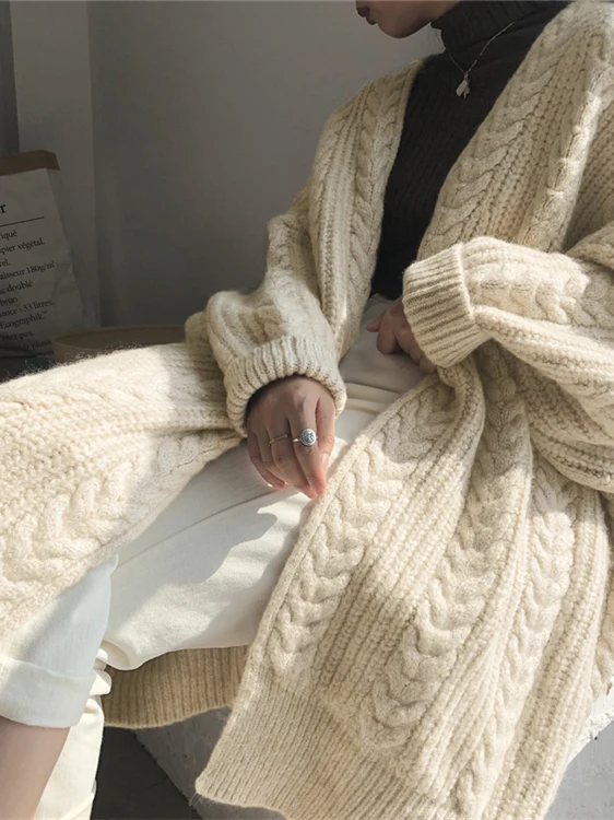 Thiened Knitted Pure Color Long Twist Sweater Coat Women's Autumn Winter New Sle Korean Loose Lazy Sle Cardigan
Thiened Knitted Pure Color Long Twist Sweater Coat Women's Autumn Winter New Sle Korean Loose Lazy Sle Cardigan